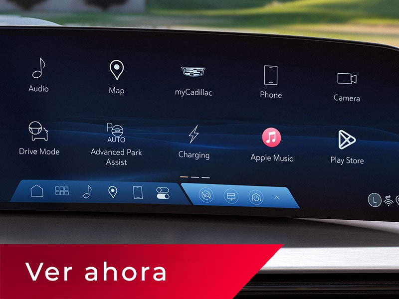 Primer plano de la pantalla de infoentretenimiento de VISTIQ 2027 que muestra varios íconos de aplicaciones y características del vehículo