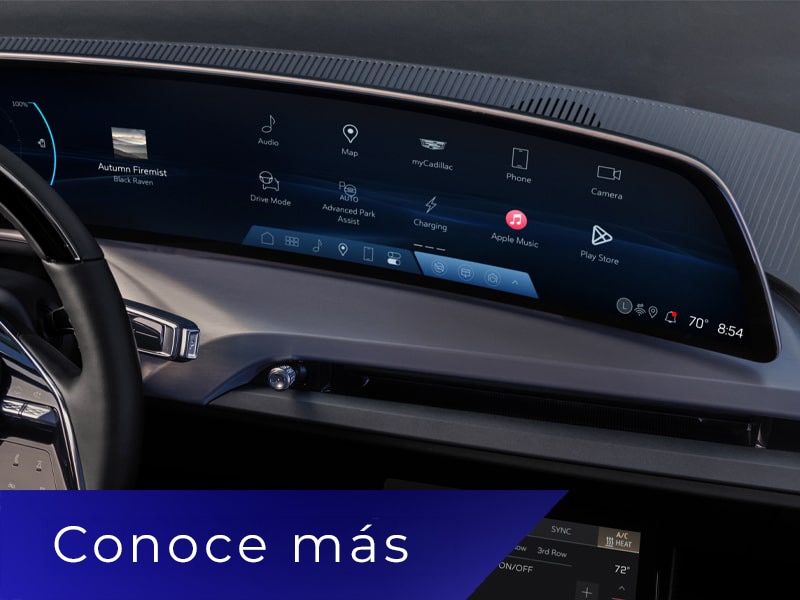 Primer plano de la pantalla de infoentretenimiento de VISTIQ 2027 que muestra varios íconos de aplicaciones y características del vehículo