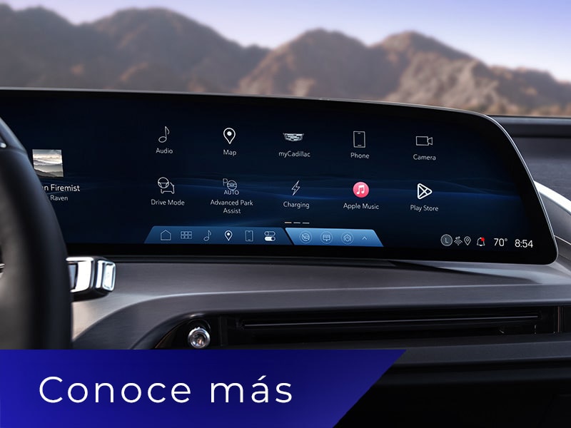 Primer plano de la pantalla de infoentretenimiento de VISTIQ 2027 que muestra varios íconos de aplicaciones y características del vehículo
